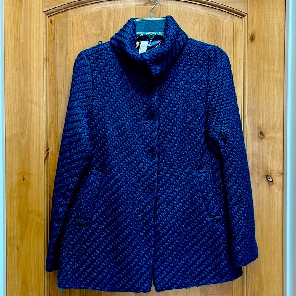 Priorities blue jacket, snap front closure and luxurious colorful lining.